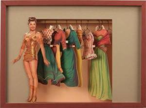 A treasured paper doll turned into an awesome shadow box.